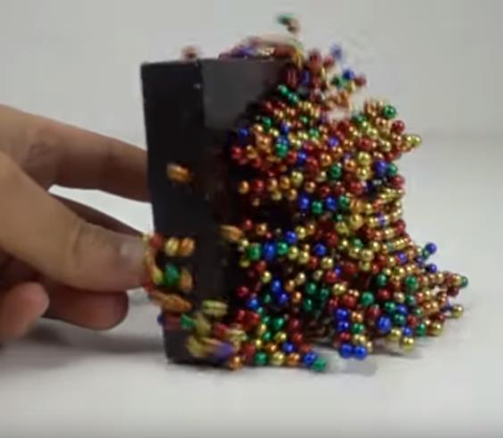 youtube.com Magnetic Balls VS Monster Magnets in Slow Motion - Magnetic Games.jpg